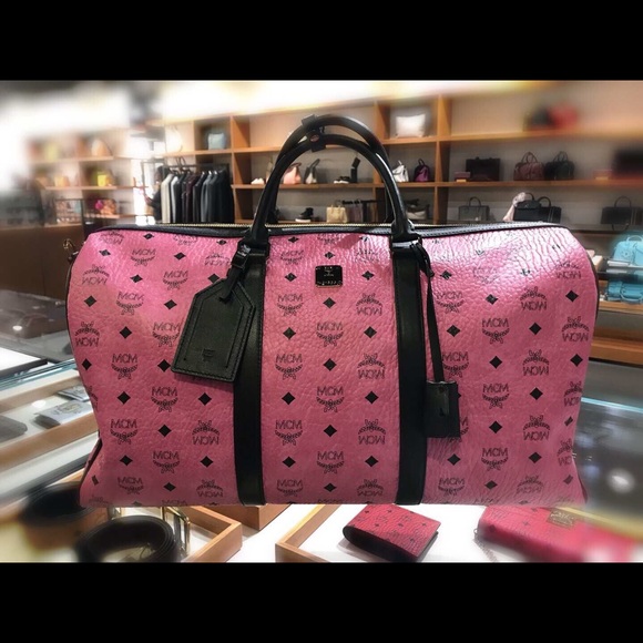 pink mcm duffle bag